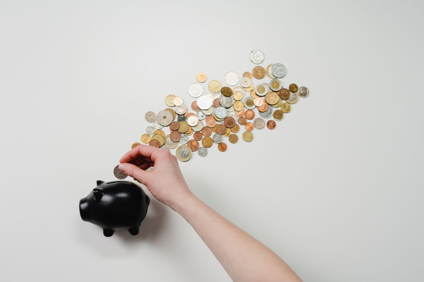 Card payment at a counter, representing money leaving a salary as deductions